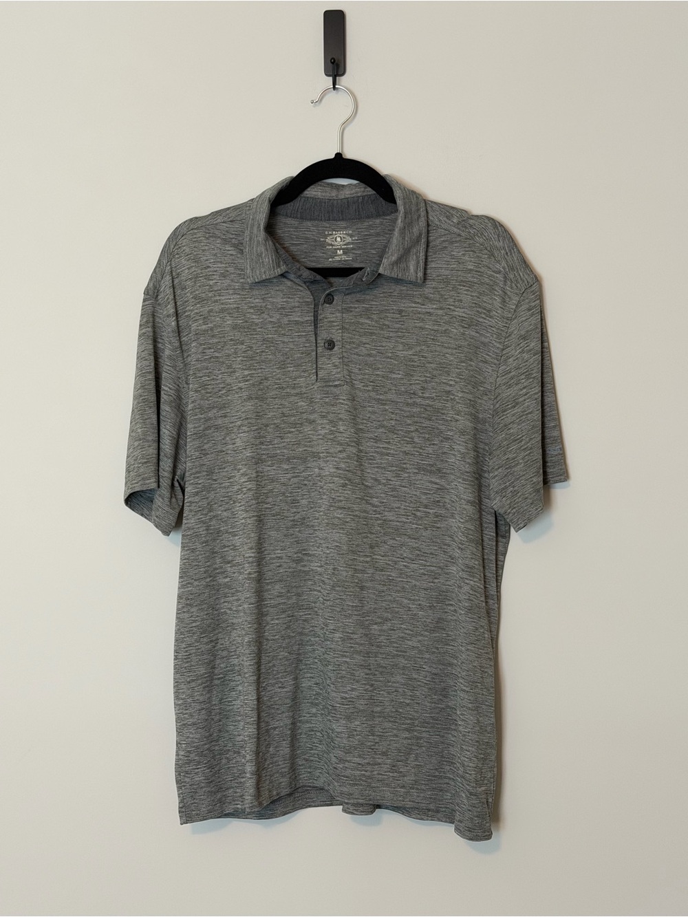 G.H. Bass & Co. men’s short sleeve performance polo in a versatile heather gray.